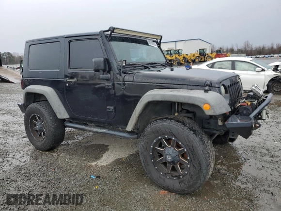 2009 Jeep Wrangler X with VIN 1J4FA241X9L735743, listed as a Copart auction lot 48109455 with 232,110 mi miles and Salvage Title. Bid and sale history available at DreamBid. Image 4.