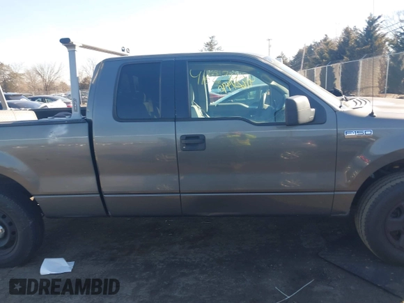 2005 Ford F-150 STX with VIN 1FTRX14W95NB07100, listed as a IAAI auction lot 41627990 with 381,000 mi miles. Bid and sale history available at carsss.com. Image 13.