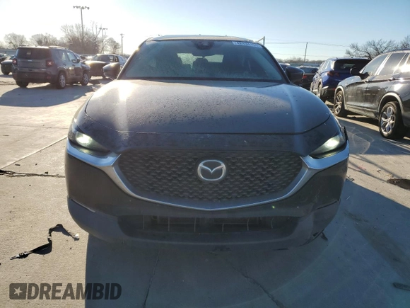 2021 Mazda CX-30 2.5 S with VIN 3MVDMAAL5MM212947, listed as a Copart auction lot 42434105 with 104,878 mi miles and Salvage Title. Bid and sale history available at carsss.com. Image 5.