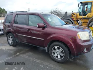 2009 Honda Pilot Touring with VIN 5FNYF48959B007813, listed as a IAAI auction lot 41823645 with 200,571 mi miles and . Bid and sale history available at carsss.com. Image 1.