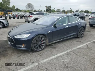 2014 Tesla Model S 60 z VIN 5YJSA1H11EFP56096, wystawiony jako Copart lot #56002345 z przebiegiem 109 084 mil mil oraz Szkoda całkowita • Salvage title. Historia ofert i sprzedaży dostępna na DreamBid. Obrazek 1.