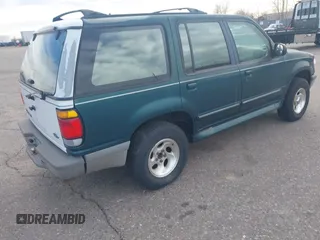 1996 Ford Explorer XL z VIN 1FMDU34X1TUCO1607, wystawiony jako IAAI lot #41182134 z przebiegiem 200 982 mil mil oraz . Historia ofert i sprzedaży dostępna na DreamBid. Obrazek 4.