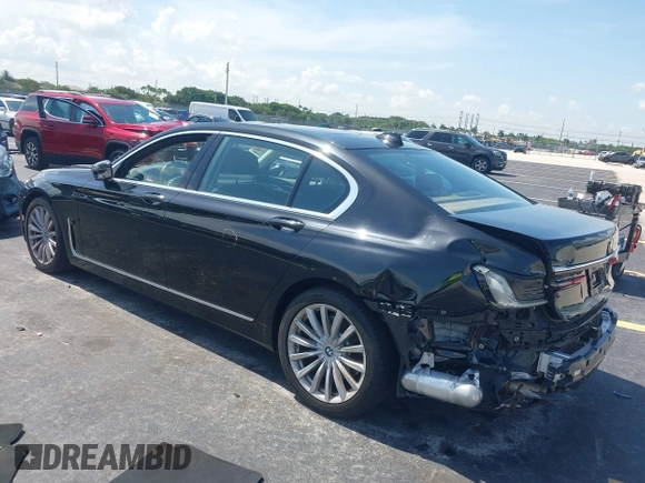 2022 BMW 7 Series 740i with VIN WBA7T2C02NCH73426, listed as a IAAI auction lot 42641007 with 49,300 mi miles and . Bid and sale history available at DreamBid. Image 3.