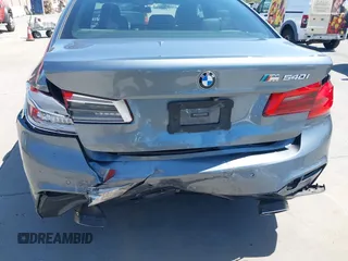 2019 BMW 5 Series 540i with VIN WBAJE5C55KWW11827, listed as a IAAI auction lot 42191127 with 72,113 mi miles and . Bid and sale history available at DreamBid. Image 6.