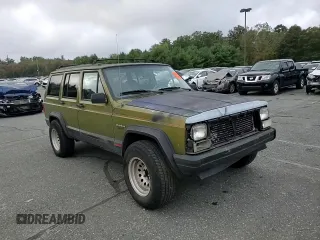 1996 Jeep Cherokee Sport with VIN 1J4FJ68S9TL291661, listed as a Copart auction lot 71968934 with 139,695 mi miles and Salvage Title. Bid and sale history available at carsss.com. Image 12.