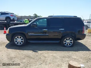 2008 GMC Yukon Denali with VIN 1GKFK63848J210877, listed as a IAAI auction lot 42096972 with 144,467 mi miles. Bid and sale history available at carsss.com. Image 15.