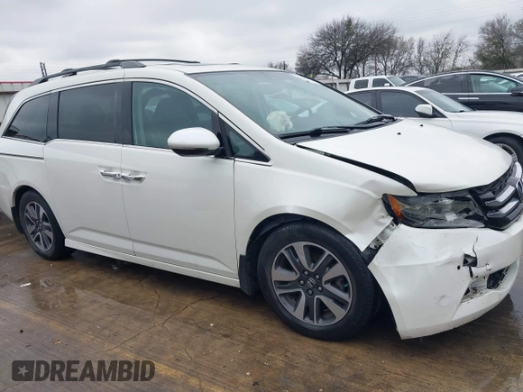 2016 Honda Odyssey Touring Elite with VIN 5FNRL5H9XGB100116, listed as a IAAI auction lot 41543464 with 160,763 mi miles and . Bid and sale history available at DreamBid. Image 13.