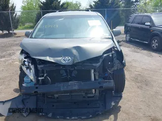 2011 Toyota Sienna LE AAS with VIN 5TDKK3DC7BS014356, listed as a IAAI auction lot 42137928 with 198,400 mi miles and . Bid and sale history available at DreamBid. Image 12.