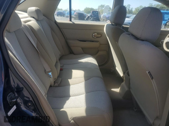 2007 Nissan Versa 1.8 SL with VIN 3N1BC11E27L432802, listed as a Copart auction lot 71018594 with 118,795 mi miles and Salvage Title. Bid and sale history available at carsss.com. Image 10.