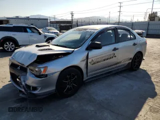 2009 Mitsubishi Lancer DE with VIN JA3AU16U49U002007, listed as a Copart auction lot 70722184 with 152,607 mi miles and Salvage Title. Bid and sale history available at carsss.com. Image 1.