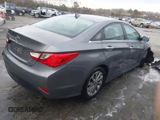 2014 Hyundai Sonata SE with VIN 5NPEC4AC5EH894598, listed as a IAAI auction lot 41242457 with 153,635 mi miles and . Bid and sale history available at DreamBid. Image 4.