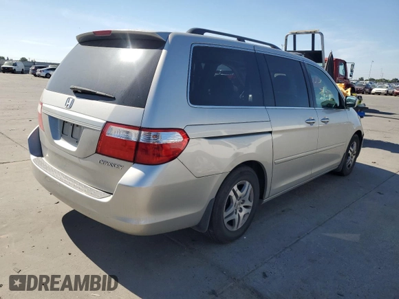 2005 Honda Odyssey EX-L z VIN 5FNRL386X5B407129, wystawiony jako Copart lot #56366655 z przebiegiem 181 893 mil mil oraz Szkoda całkowita • Salvage title. Historia ofert i sprzedaży dostępna na DreamBid. Obrazek 3.