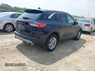 2021 Ford Escape SE with VIN 1FMCU9G65MUB03411, listed as a IAAI auction lot 42423432 with 121,755 mi miles and . Bid and sale history available at DreamBid. Image 4.