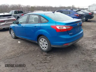 2012 Ford Focus SE with VIN 1FAHP3F26CL254085, listed as a IAAI auction lot 41901816 with 123,380 mi miles. Bid and sale history available at carsss.com. Image 3.