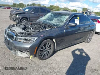 2021 BMW 3 Series 330i xDrive with VIN 3MW5R7J01M8B49173, listed as a IAAI auction lot 41672538 with 82,259 mi miles and . Bid and sale history available at carsss.com. Image 2.