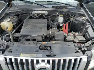 2010 Mercury Mariner Premier с VIN 4M2CN8HG5AKJ21458, выставлен на аукционе Copart как лот 53144885 с пробегом 111 168 миль миль и Списание • Salvage title. История ставок и продаж доступна на DreamBid. Изображение 13.
