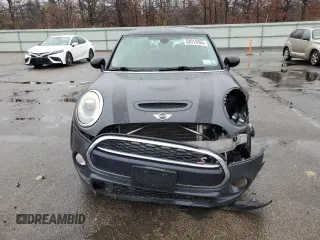 2014 MINI Hardtop S with VIN WMWXM7C54ET985344, listed as a Copart auction lot 52012465 with 87,017 mi miles and Salvage title. Bid and sale history available at DreamBid. Image 5.