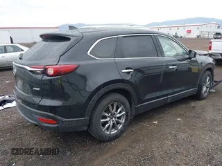 2019 Mazda CX-9 Touring with VIN JM3TCBCY6K0300248, listed as a IAAI auction lot 42310992 with 112,707 mi miles and . Bid and sale history available at DreamBid. Image 4.