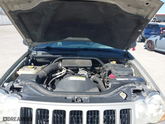 2010 Jeep Grand Cherokee Laredo with VIN 1J4PS4GK1AC111965, listed as a IAAI auction lot 41776362 with 209,042 mi miles. Bid and sale history available at carsss.com. Image 10.
