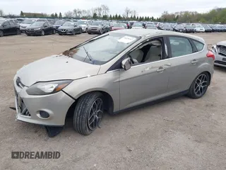 2016 Ford Focus Titanium with VIN 1FADP3N21GL346002, listed as a IAAI auction lot 39229347 with 114,683 mi miles and . Bid and sale history available at DreamBid. Image 2.