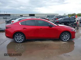 2023 Mazda 3 S Preferred with VIN 3MZBPACM2PM355071, listed as a IAAI auction lot 41880149 with 40,669 mi miles and . Bid and sale history available at DreamBid. Image 13.