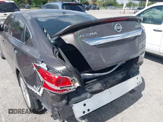 2013 Nissan Altima SV with VIN 1N4BL3AP7DC244977, listed as a IAAI auction lot 41656408 with 151,807 mi miles and . Bid and sale history available at DreamBid. Image 6.