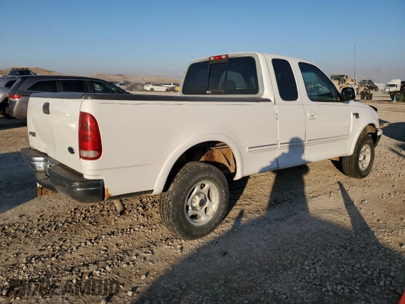 1998 Ford F-150 z VIN 1FTZX18W3WKB01774, wystawiony jako Copart lot #88670315 z przebiegiem 102 301 mil mil oraz Szkoda całkowita • Salvage title. Historia ofert i sprzedaży dostępna na DreamBid. Obrazek 3.
