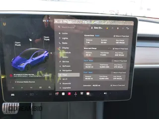 2023 Tesla Model Y Performance with VIN 7SAYGDEF6PF854797, listed as a IAAI auction lot 41319332 with 46,132 mi miles and . Bid and sale history available at DreamBid. Image 18.