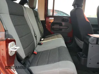 2007 Jeep Wrangler Unlimited X z VIN 1J4GA391X7L169728, wystawiony jako Copart lot #59484265 z przebiegiem 165 674 mil mil oraz Szkoda całkowita • Salvage title. Historia ofert i sprzedaży dostępna na DreamBid. Obrazek 10.
