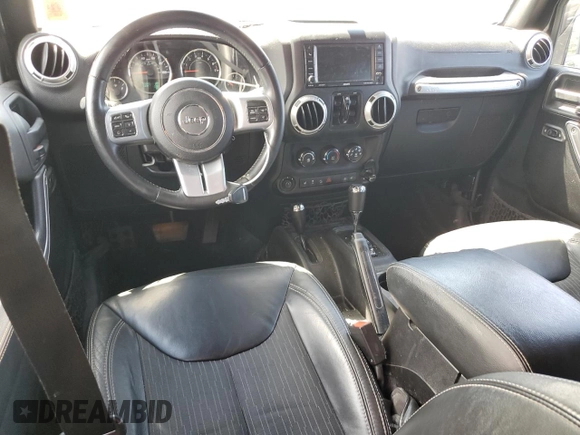 2015 Jeep Wrangler Unlimited Freedom with VIN 1C4HJWDG0FL598947, listed as a Copart auction lot 61794214 with 125,778 mi miles and Salvage title. Bid and sale history available at DreamBid. Image 8.