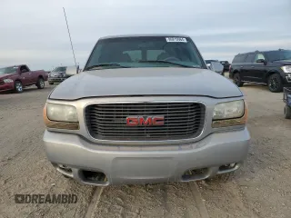 2000 GMC Denali z VIN 1GKEK63R9YR225073, wystawiony jako Copart lot #86819964 z przebiegiem 207 827 mil mil oraz Szkody całkowita. Historia ofert i sprzedaży dostępna na DreamBid. Obrazek 5.