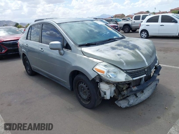 2009 Nissan Versa 1.8 S with VIN 3N1BC11E39L381507, listed as a IAAI auction lot 41956643 with 120,730 mi miles. Bid and sale history available at carsss.com. Image 1.