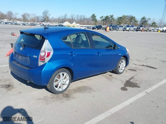 2013 Toyota Prius c One with VIN JTDKDTB32D1055135, listed as a IAAI auction lot 41889844 with 98,220 mi miles. Bid and sale history available at carsss.com. Image 4.