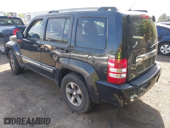 2008 Jeep Liberty Sport with VIN 1J8GP28KX8W227953, listed as a IAAI auction lot 42049588 with 310,901 mi miles. Bid and sale history available at carsss.com. Image 3.