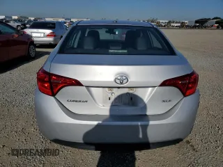 2019 Toyota Corolla L z VIN 5YFBURHE1KP922156, wystawiony jako Copart lot #51513865 z przebiegiem 211 756 mil mil oraz Szkoda całkowita • Salvage title. Historia ofert i sprzedaży dostępna na DreamBid. Obrazek 6.