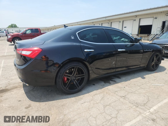 2014 Maserati Ghibli S Q4 with VIN ZAM57RTA5E1122165, listed as a Copart auction lot 60257835 with Not provided miles and Salvage title. Bid and sale history available at DreamBid. Image 3.
