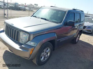 2012 Jeep Liberty Sport with VIN 1C4PJLAK7CW147270, listed as a IAAI auction lot 42016050 with 166,583 mi miles. Bid and sale history available at carsss.com. Image 2.
