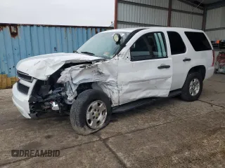 2012 Chevrolet Tahoe Commercial with VIN 1GNSK2E03CR163577, listed as a Copart auction lot 84611234 with 98,056 mi miles and Salvage title. Bid and sale history available at DreamBid. Image 1.