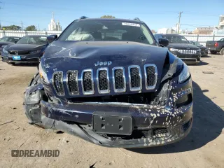 2015 Jeep Cherokee Latitude with VIN 1C4PJMCB9FW709077, listed as a Copart auction lot 76240454 with 104,882 mi miles and Salvage Title. Bid and sale history available at DreamBid. Image 5.