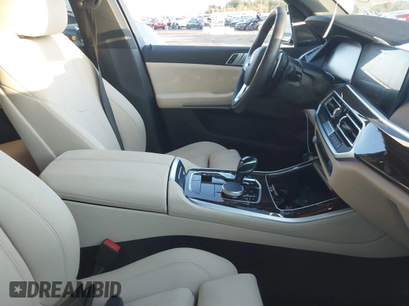 2021 BMW X5 sDrive40i with VIN 5UXCR4C01M9F02587, listed as a IAAI auction lot 41111144 with 23,844 mi miles. Bid and sale history available at carsss.com. Image 5.
