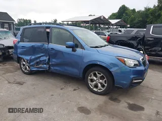 2018 Subaru Forester Touring with VIN JF2SJAWC6JH597365, listed as a IAAI auction lot 42606953 with 66,340 mi miles and . Bid and sale history available at DreamBid. Image 1.