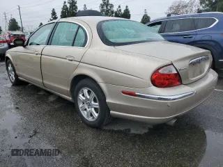 2003 Jaguar S-Type with VIN SAJEA01T93FM49689, listed as a Copart auction lot 43930875 with 303,648 mi miles and Clean Title. Bid and sale history available at DreamBid. Image 2.