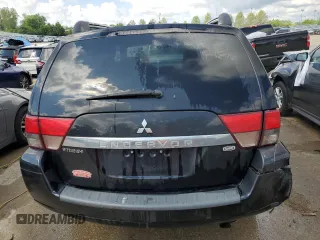 2011 Mitsubishi Endeavor SE z VIN 4A4JN3AS3BE009099, wystawiony jako Copart lot #54279974 z przebiegiem 164 498 mil mil oraz Szkoda całkowita • Salvage title. Historia ofert i sprzedaży dostępna na DreamBid. Obrazek 6.