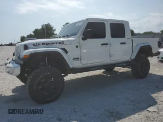 2023 Jeep Gladiator Sport S с VIN 1C6HJTAG1PL571817, выставлен на аукционе Copart как лот 62929284 с пробегом 36 500 миль миль и Чистый • Clean title. История ставок и продаж доступна на DreamBid. Изображение 1.