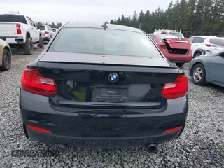 2015 BMW 2 Series M235i with VIN WBA1J7C55FV358527, listed as a IAAI auction lot 41839031 with 81,900 mi miles and . Bid and sale history available at carsss.com. Image 16.