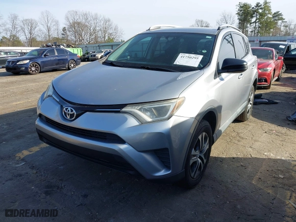 2016 Toyota RAV4 LE with VIN 2T3ZFREV0GW235051, listed as a IAAI auction lot 41750295 with 157,132 mi miles. Bid and sale history available at carsss.com. Image 17.