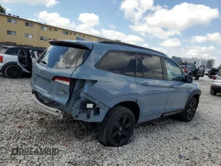 2022 Honda Pilot TrailSport z VIN 5FNYF6H86NB084266, wystawiony jako Copart lot #52640885 z przebiegiem 32 651 mil mil oraz Szkoda całkowita • Salvage title. Historia ofert i sprzedaży dostępna na DreamBid. Obrazek 3.