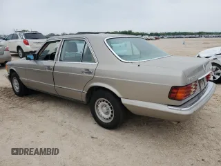 1984 Mercedes-Benz 300 with VIN WDBCB20B7EA028754, listed as a Copart auction lot 50339135 with 152,033 mi miles and Salvage Title. Bid and sale history available at DreamBid. Image 2.