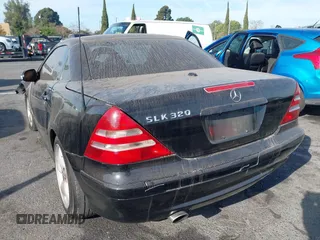 2003 Mercedes-Benz SLK 320 with VIN WDBKK65FX3F283784, listed as a IAAI auction lot 41152256 with 147,594 mi miles and . Bid and sale history available at DreamBid. Image 3.