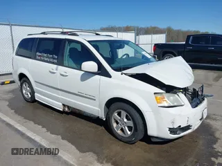 2010 Dodge Grand Caravan SXT with VIN 2D4RN5D14AR420265, listed as a IAAI auction lot 41970366 with 117,208 mi miles and . Bid and sale history available at DreamBid. Image 1.